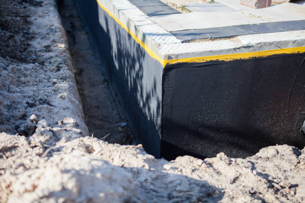 Professional Wet Basement Repair technician working in Hartford, MI